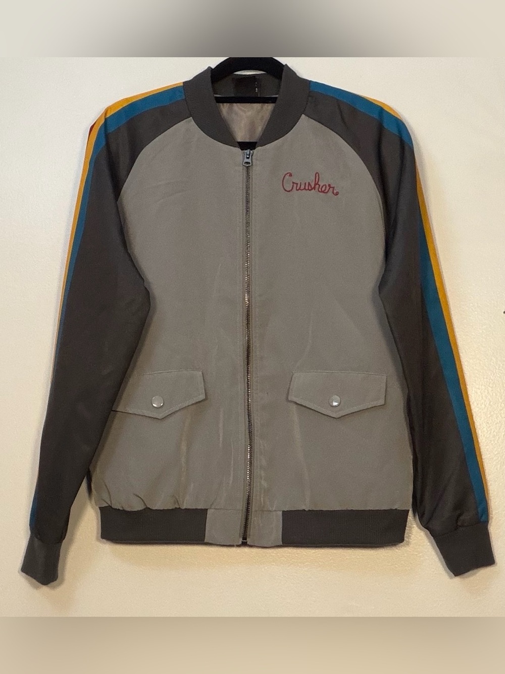 Her Universe Gray Bomber Jacket with Blue and Yellow Stripe Accents